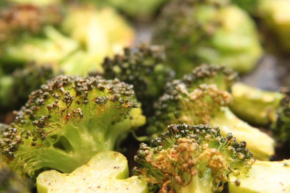 Close-up of roasted broccoli florets with browned, crisp edges